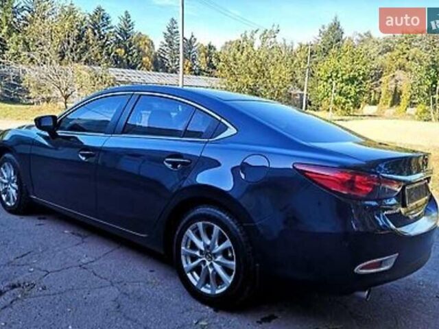 Синий Мазда 6, объемом двигателя 2 л и пробегом 165 тыс. км за 12000 $, фото 1 на Automoto.ua