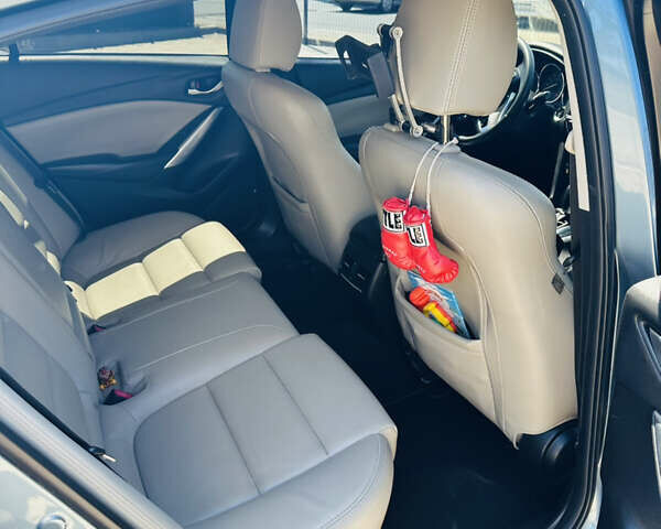 Синий Мазда 6, объемом двигателя 2.49 л и пробегом 243 тыс. км за 10500 $, фото 9 на Automoto.ua