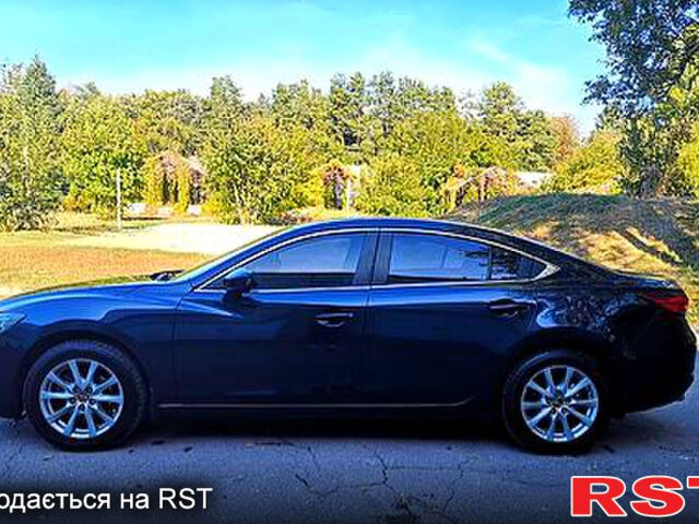 Синий Мазда 6, объемом двигателя 2 л и пробегом 165 тыс. км за 12000 $, фото 1 на Automoto.ua
