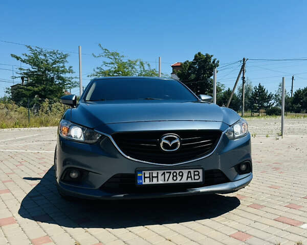 Синий Мазда 6, объемом двигателя 2.49 л и пробегом 243 тыс. км за 10500 $, фото 1 на Automoto.ua