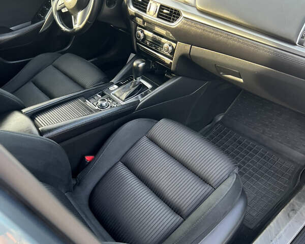 Синий Мазда 6, объемом двигателя 2 л и пробегом 170 тыс. км за 12800 $, фото 18 на Automoto.ua