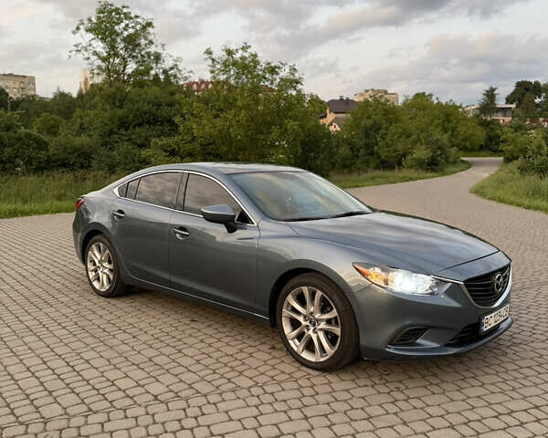 Синий Мазда 6, объемом двигателя 2.49 л и пробегом 176 тыс. км за 13000 $, фото 1 на Automoto.ua
