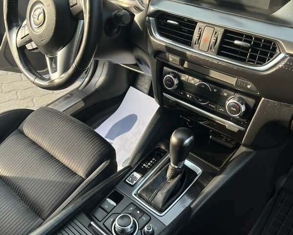 Синий Мазда 6, объемом двигателя 2 л и пробегом 170 тыс. км за 12800 $, фото 22 на Automoto.ua