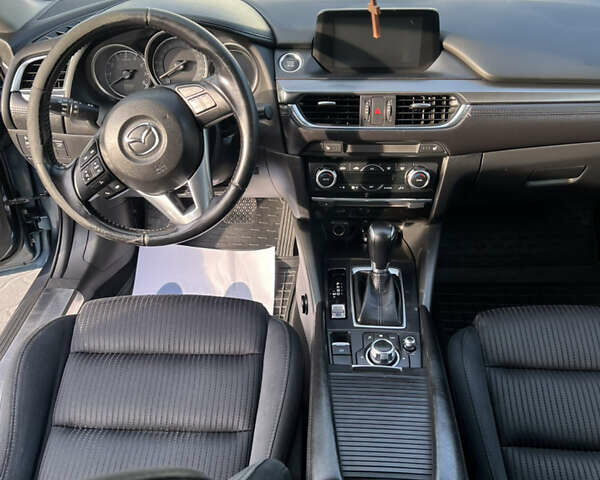 Синий Мазда 6, объемом двигателя 2 л и пробегом 170 тыс. км за 12800 $, фото 21 на Automoto.ua