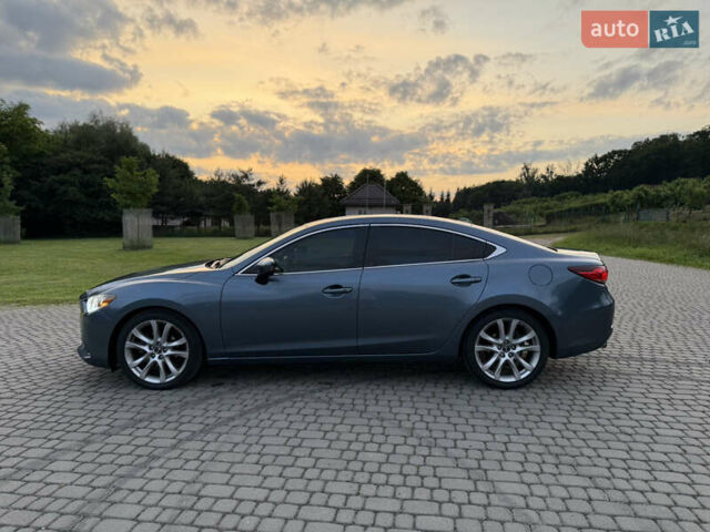 Синий Мазда 6, объемом двигателя 2.49 л и пробегом 176 тыс. км за 13000 $, фото 6 на Automoto.ua