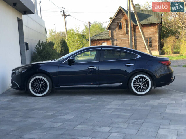 Синий Мазда 6, объемом двигателя 2.19 л и пробегом 14 тыс. км за 18000 $, фото 7 на Automoto.ua