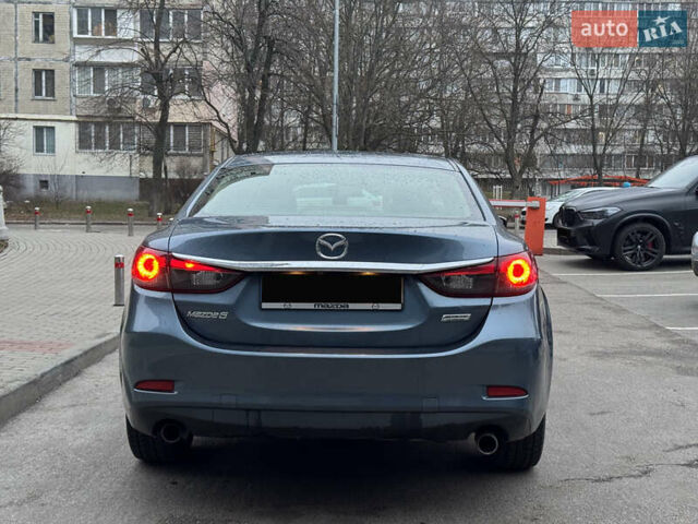 Синий Мазда 6, объемом двигателя 2.49 л и пробегом 129 тыс. км за 14500 $, фото 5 на Automoto.ua