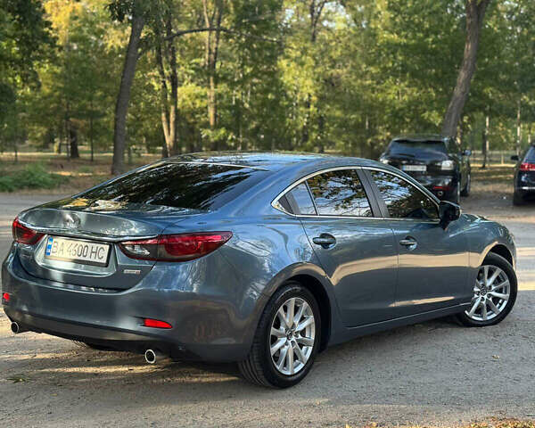 Синий Мазда 6, объемом двигателя 2.19 л и пробегом 135 тыс. км за 15400 $, фото 17 на Automoto.ua