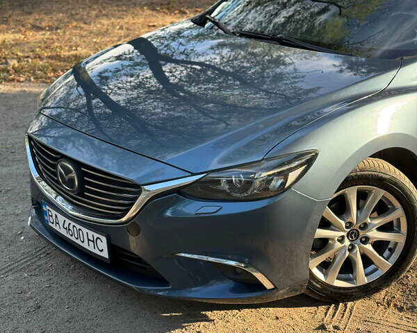 Синий Мазда 6, объемом двигателя 2.19 л и пробегом 135 тыс. км за 15400 $, фото 6 на Automoto.ua