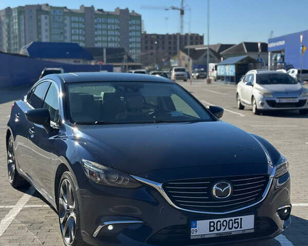 Синий Мазда 6, объемом двигателя 2.19 л и пробегом 190 тыс. км за 17299 $, фото 2 на Automoto.ua