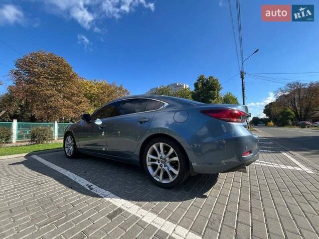 Синий Мазда 6, объемом двигателя 2.49 л и пробегом 227 тыс. км за 15000 $, фото 4 на Automoto.ua