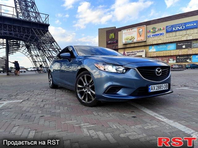 Синий Мазда 6, объемом двигателя 2.5 л и пробегом 170 тыс. км за 14000 $, фото 5 на Automoto.ua