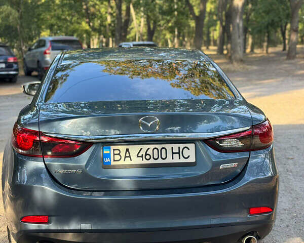 Синий Мазда 6, объемом двигателя 2.19 л и пробегом 135 тыс. км за 15400 $, фото 2 на Automoto.ua