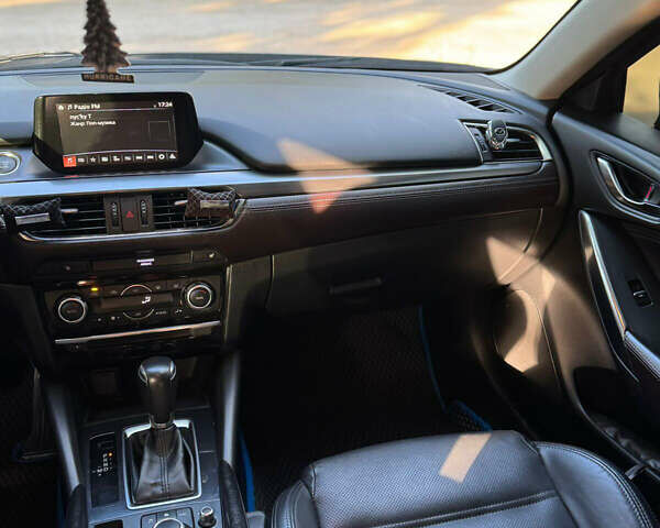 Синий Мазда 6, объемом двигателя 2.19 л и пробегом 135 тыс. км за 15400 $, фото 1 на Automoto.ua