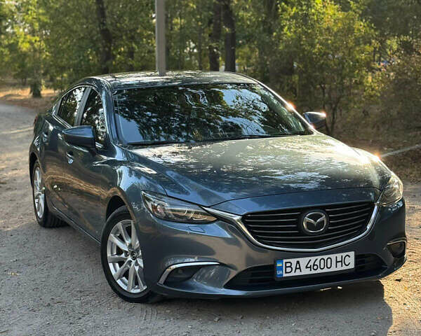 Синий Мазда 6, объемом двигателя 2.19 л и пробегом 135 тыс. км за 15400 $, фото 5 на Automoto.ua