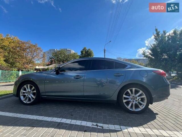 Синий Мазда 6, объемом двигателя 2.49 л и пробегом 227 тыс. км за 15000 $, фото 5 на Automoto.ua