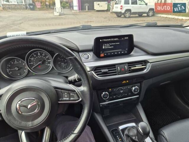 Синий Мазда 6, объемом двигателя 2.49 л и пробегом 118 тыс. км за 15000 $, фото 32 на Automoto.ua
