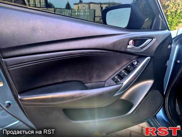 Синий Мазда 6, объемом двигателя 2.5 л и пробегом 170 тыс. км за 14000 $, фото 12 на Automoto.ua