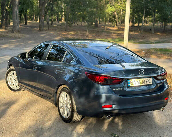Синий Мазда 6, объемом двигателя 2.19 л и пробегом 135 тыс. км за 15400 $, фото 8 на Automoto.ua