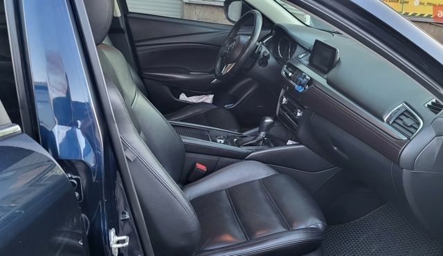 Синий Мазда 6, объемом двигателя 2.19 л и пробегом 182 тыс. км за 14500 $, фото 5 на Automoto.ua