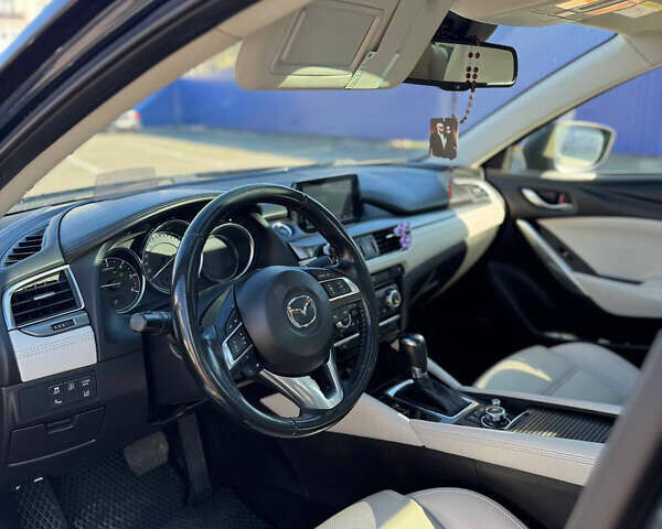 Синий Мазда 6, объемом двигателя 2.19 л и пробегом 190 тыс. км за 17299 $, фото 48 на Automoto.ua