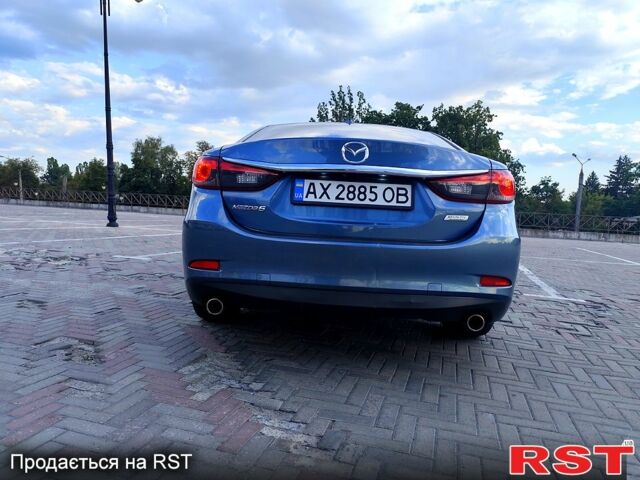 Синий Мазда 6, объемом двигателя 2.5 л и пробегом 170 тыс. км за 14000 $, фото 2 на Automoto.ua