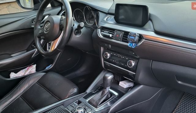 Синий Мазда 6, объемом двигателя 2.19 л и пробегом 182 тыс. км за 14500 $, фото 7 на Automoto.ua