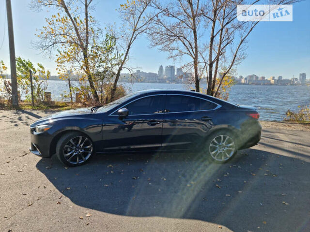 Синий Мазда 6, объемом двигателя 2.49 л и пробегом 91 тыс. км за 14500 $, фото 5 на Automoto.ua