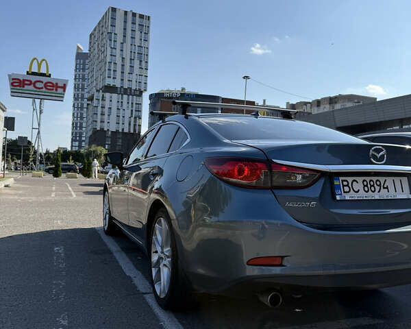 Синій Мазда 6, об'ємом двигуна 2.49 л та пробігом 153 тис. км за 13000 $, фото 4 на Automoto.ua