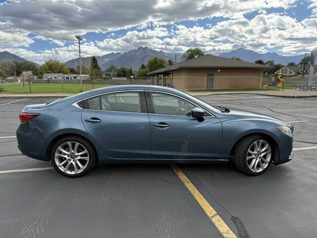 Синий Мазда 6, объемом двигателя 2.5 л и пробегом 70 тыс. км за 4000 $, фото 6 на Automoto.ua