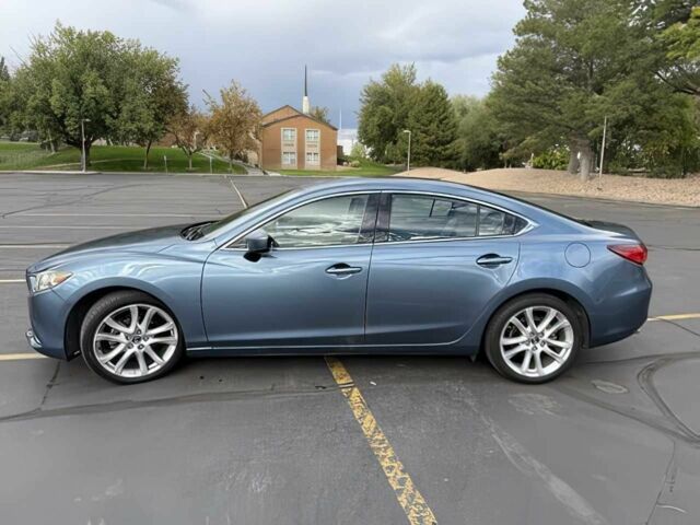 Синий Мазда 6, объемом двигателя 2.5 л и пробегом 70 тыс. км за 4000 $, фото 2 на Automoto.ua