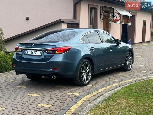Синій Мазда 6, об'ємом двигуна 2.49 л та пробігом 229 тис. км за 14450 $, фото 6 на Automoto.ua