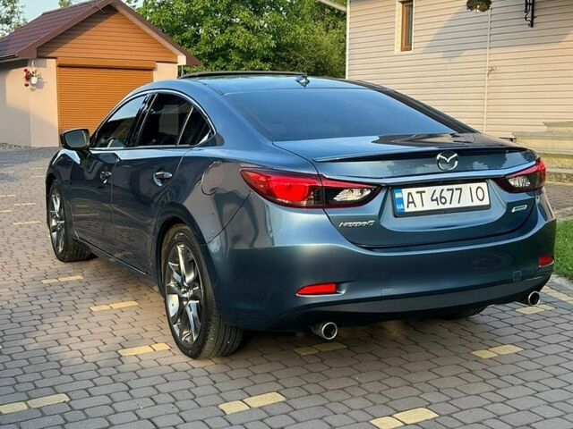 Синий Мазда 6, объемом двигателя 2.49 л и пробегом 229 тыс. км за 14500 $, фото 6 на Automoto.ua