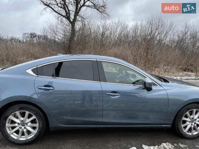 Синий Мазда 6, объемом двигателя 2.49 л и пробегом 133 тыс. км за 13400 $, фото 1 на Automoto.ua