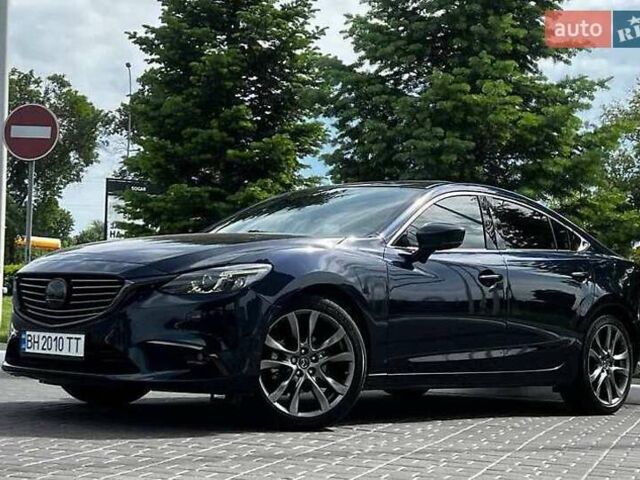 Синій Мазда 6, об'ємом двигуна 2.49 л та пробігом 105 тис. км за 15000 $, фото 1 на Automoto.ua