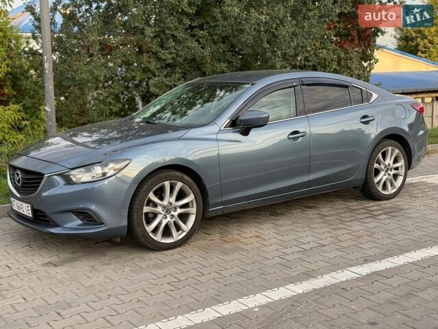 Синий Мазда 6, объемом двигателя 2.5 л и пробегом 144 тыс. км за 12600 $, фото 1 на Automoto.ua