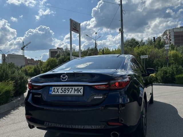 Синій Мазда 6, об'ємом двигуна 2.5 л та пробігом 230 тис. км за 13000 $, фото 4 на Automoto.ua