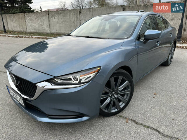 Синий Мазда 6, объемом двигателя 2.49 л и пробегом 64 тыс. км за 17500 $, фото 4 на Automoto.ua