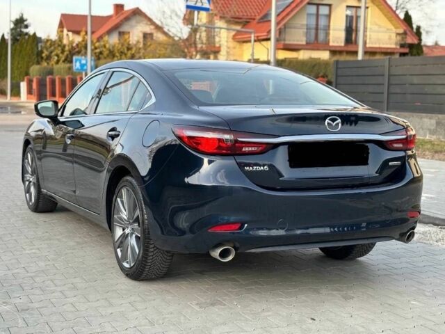 Синий Мазда 6, объемом двигателя 2.5 л и пробегом 72 тыс. км за 11200 $, фото 5 на Automoto.ua