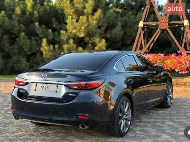Синий Мазда 6, объемом двигателя 2.49 л и пробегом 96 тыс. км за 16000 $, фото 1 на Automoto.ua