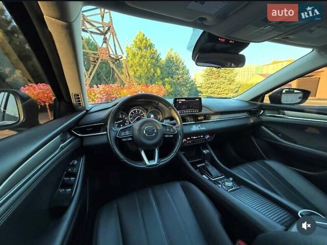 Синий Мазда 6, объемом двигателя 2.49 л и пробегом 96 тыс. км за 16000 $, фото 4 на Automoto.ua