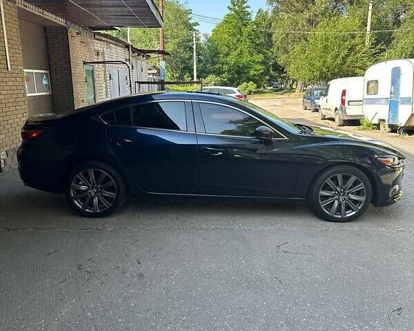 Синій Мазда 6, об'ємом двигуна 2.49 л та пробігом 99 тис. км за 18800 $, фото 1 на Automoto.ua