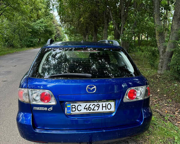 Синий Мазда 6, объемом двигателя 2 л и пробегом 305 тыс. км за 3300 $, фото 2 на Automoto.ua