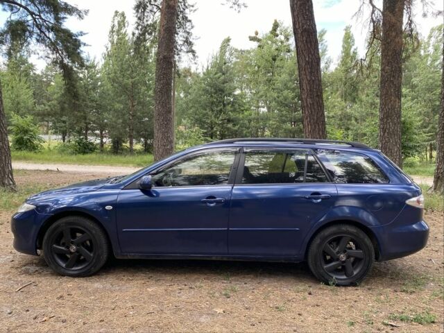 Синий Мазда 6, объемом двигателя 2 л и пробегом 285 тыс. км за 2950 $, фото 2 на Automoto.ua