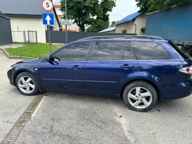 Синий Мазда 6, объемом двигателя 2 л и пробегом 245 тыс. км за 3200 $, фото 3 на Automoto.ua