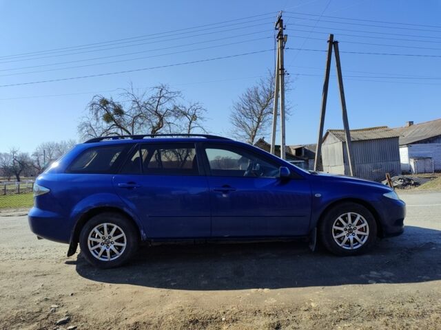 Синий Мазда 6, объемом двигателя 2 л и пробегом 348 тыс. км за 1400 $, фото 6 на Automoto.ua