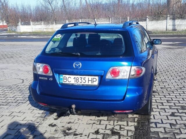 Синій Мазда 6, об'ємом двигуна 2 л та пробігом 402 тис. км за 2900 $, фото 2 на Automoto.ua
