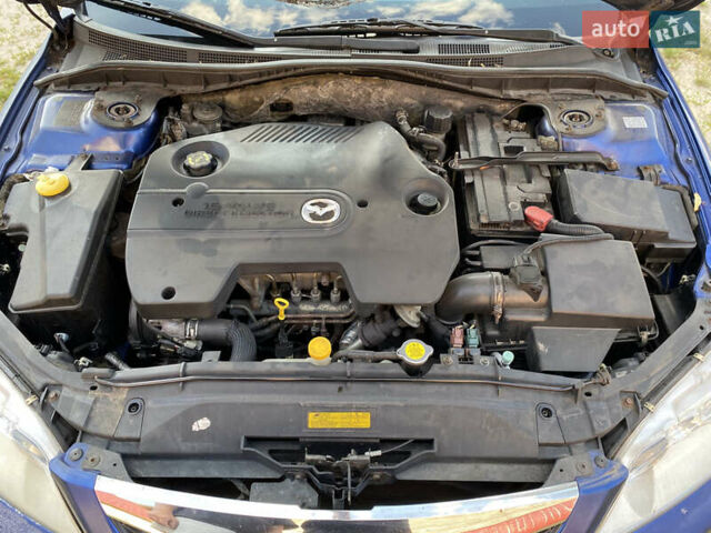 Синій Мазда 6, об'ємом двигуна 2 л та пробігом 220 тис. км за 3000 $, фото 14 на Automoto.ua