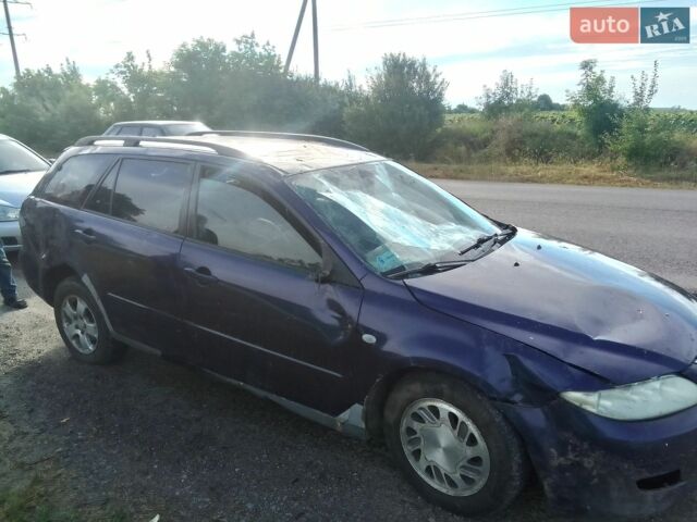 Синий Мазда 6, объемом двигателя 1.9 л и пробегом 280 тыс. км за 700 $, фото 1 на Automoto.ua