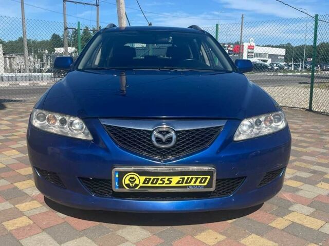 Синий Мазда 6, объемом двигателя 2 л и пробегом 306 тыс. км за 3800 $, фото 1 на Automoto.ua